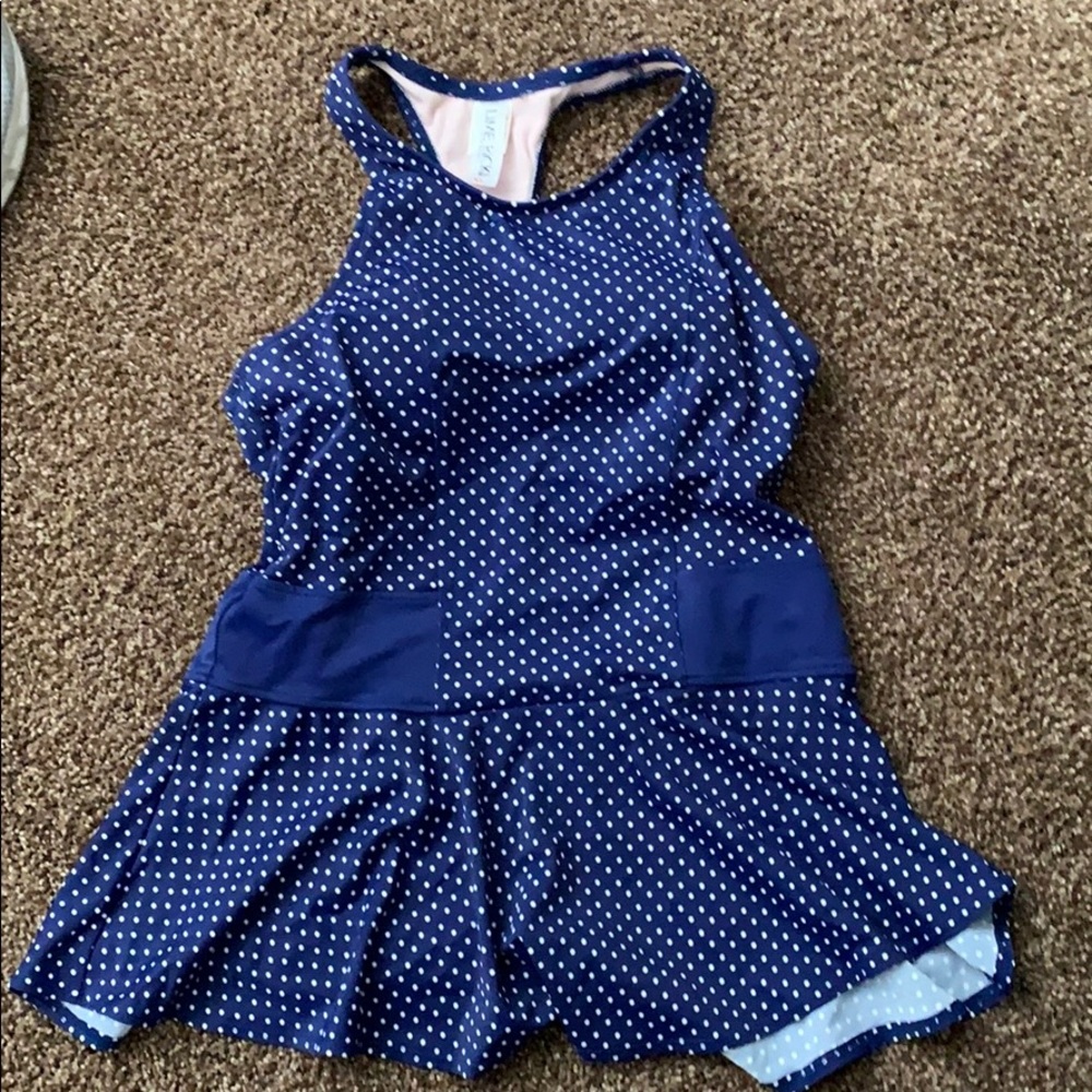 High necked peplum swim top